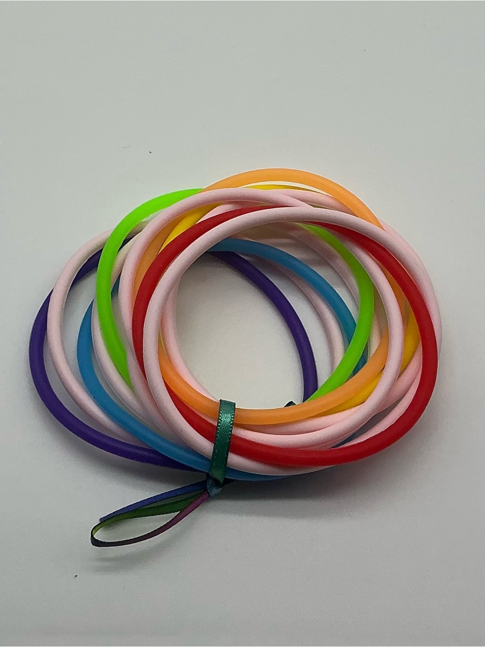 Set of 12 Pastel Pink and Rainbow Colored Jelly Bracelets